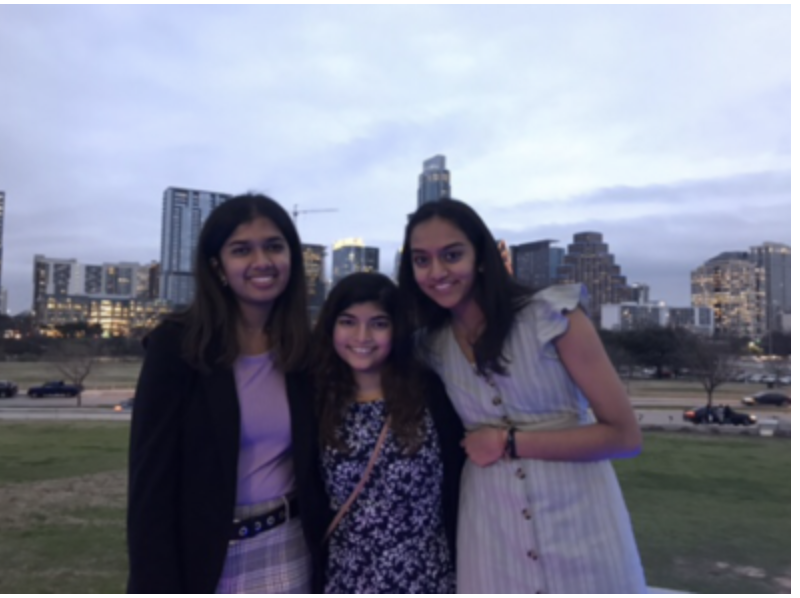 Sudiksha Pradhan 21, Shawkin Kabir 21, and Sruti Mohankumar 21 pose for a photo outside the Long Center for the Performing Arts. They were one of the groups who won the Raise Your Voice Award. Photo courtesy of Shawkin Kabir 21.