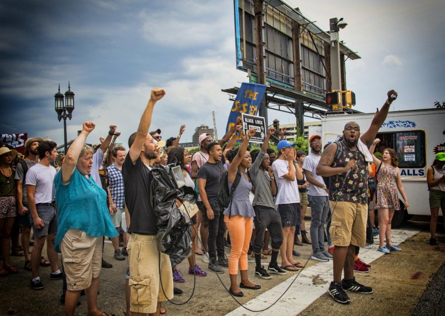 Black Lives Matter protesters gather to demonstrate against police brutality.