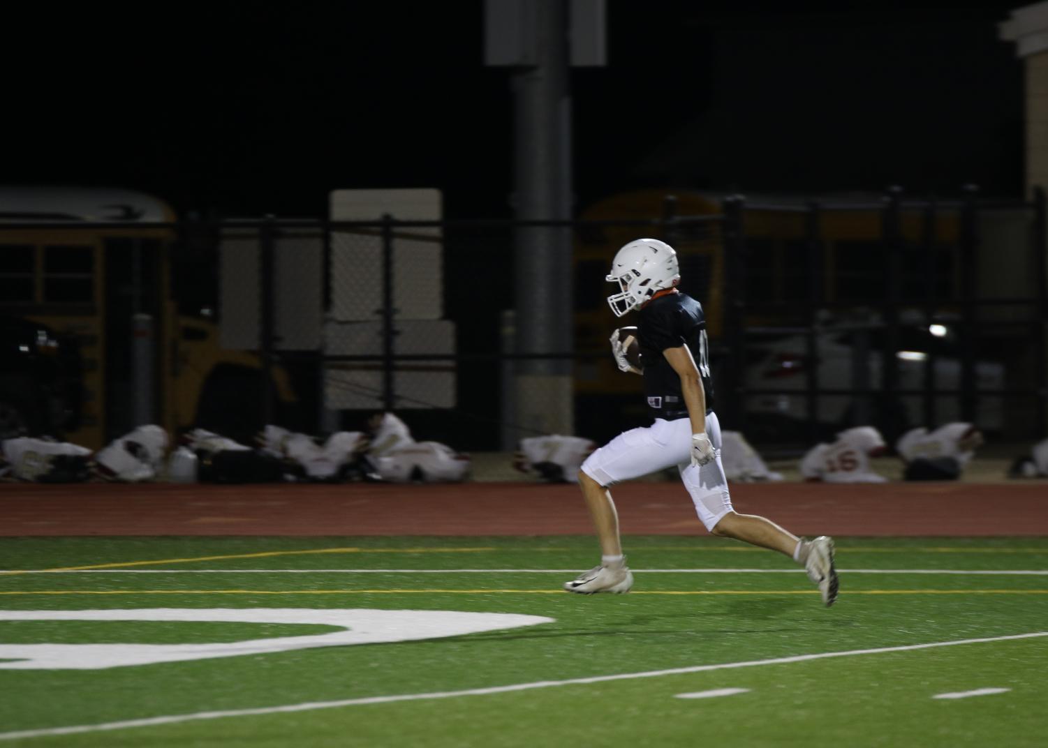 GALLERY%3A+Varsity+Football+Faces+Off+in+Preseason+Scrimmage+vs.+Rouse