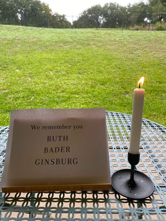 Keana Saberi ‘21 lights a candle in honor of Ruth Bader Ginsburgs death during her virtual event.