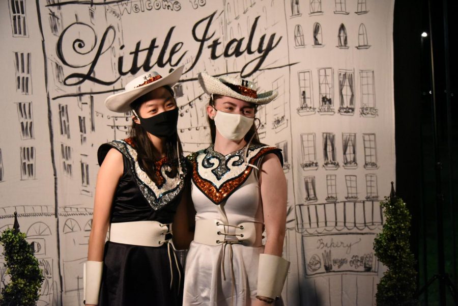 SunDancers Vivian Lang 21 and Josie Herrin 21 pose in front of the Little Italy themed backdrop. Photo Courtesy of Yu Su