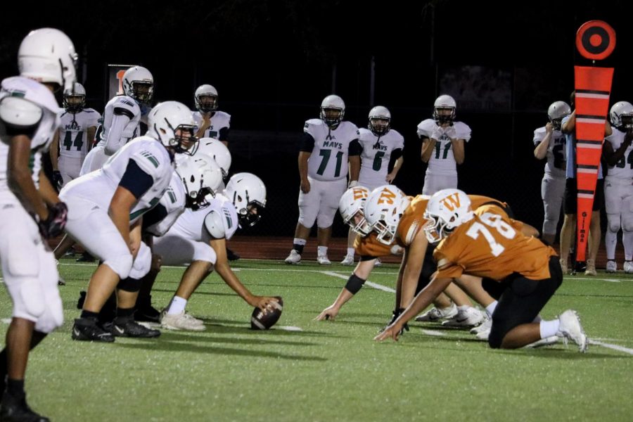 The Warrior defense gets ready to defend the next Maverick play. Their play ran incomplete and was successfully defended.