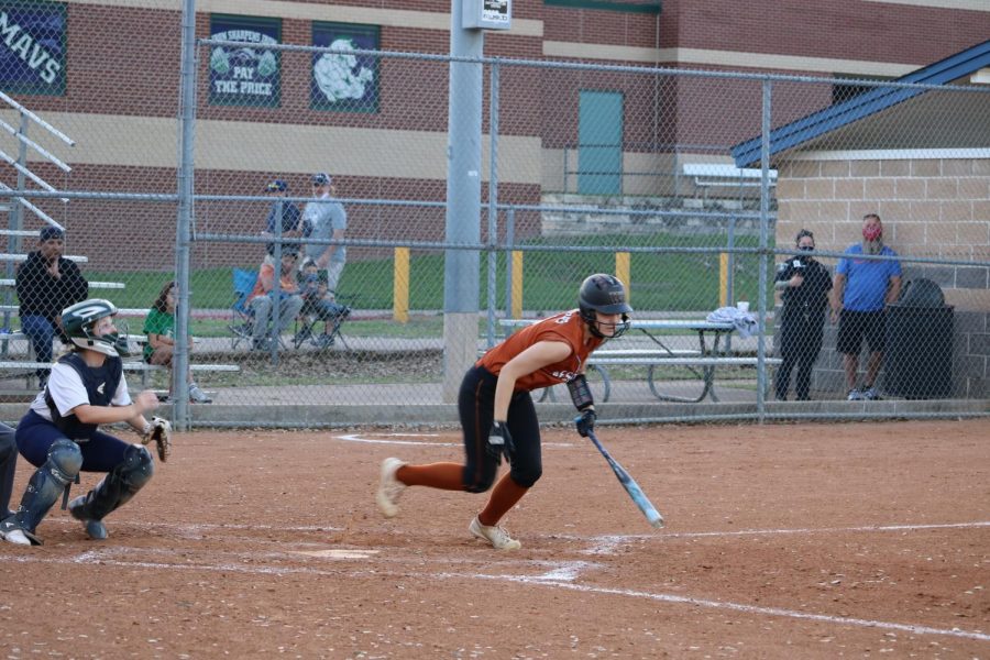 Base runner Sarah McCaughey 22 runs towards one of the four points on the infield. McCaughey was able to reach it on time which resulted in a point for the Warriors.  