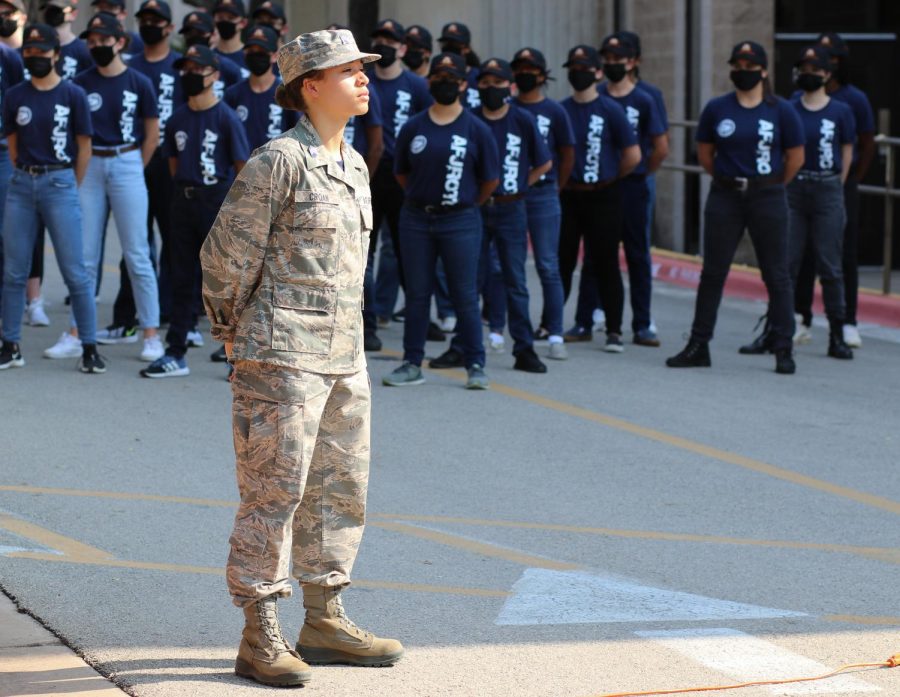 Cadet Captain Veronica Croan 22 stands in attention position as the speakers address the crowd. Croan addressed the JROTC members by giving them commands.
