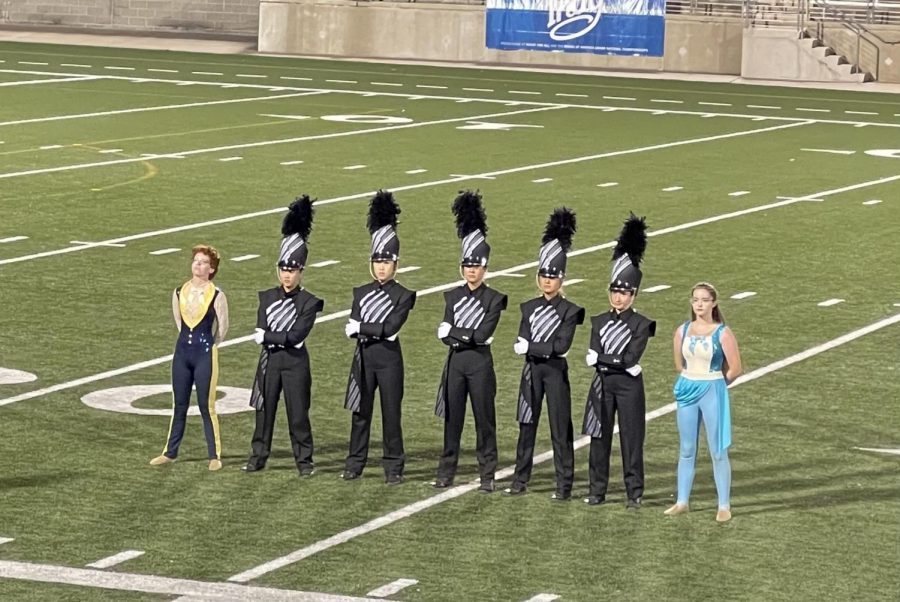 Drum Majors and Color Guard captains wait for the announcement of how well the band placed at the finals award ceremony. Photo courtesy of Ms. Julie Pitner.
