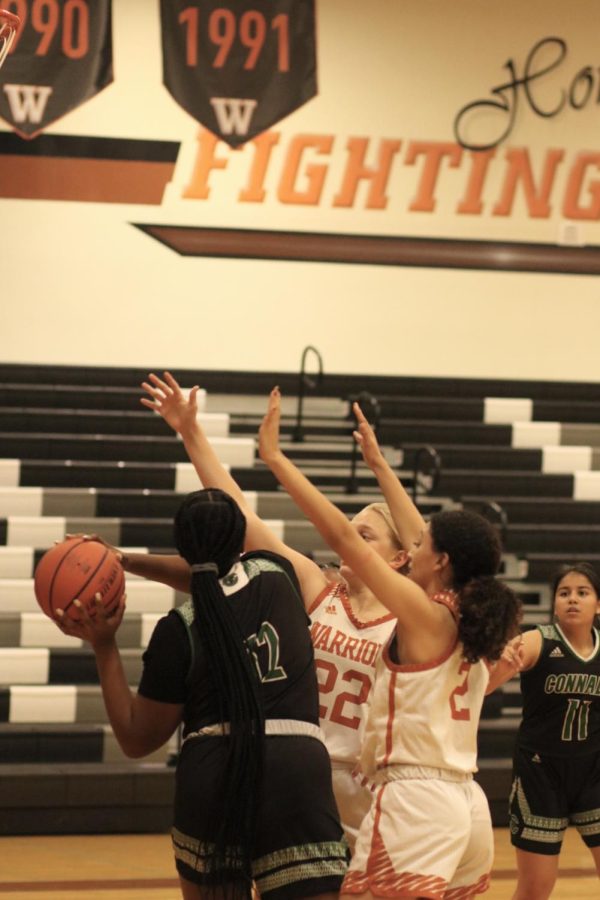Campbell Hardin 24 and Heaven Arteaga 24 guard their opponent. They were able to steal the ball and score.
