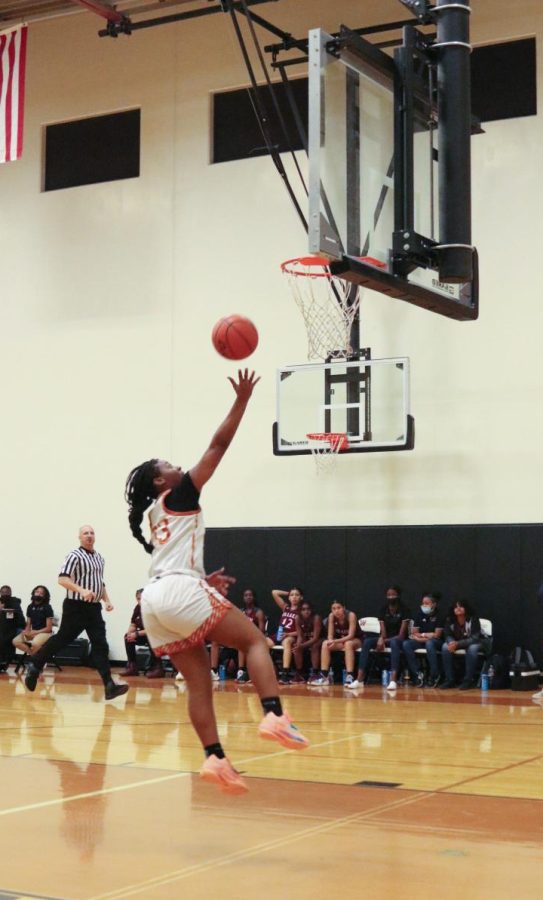 Jazlynn Gardenhire 24 shoots the ball after a steal. The final score of the game was 21-15.