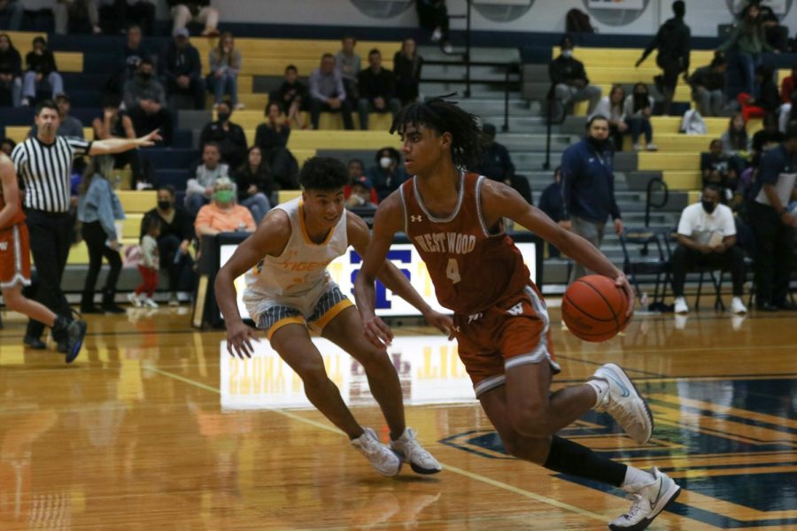 With an opposing player trailing almost immediately behind him, Gabe Parr ‘23 runs across the gym in order to pass the ball along to his teammates. This was during the third quarter, where the Warriors achieved their highest lead. “Stony Point has some really good scores and they’re really athletic,” Parr said, “and we played an amazing defense, just to keep them low scoring.”