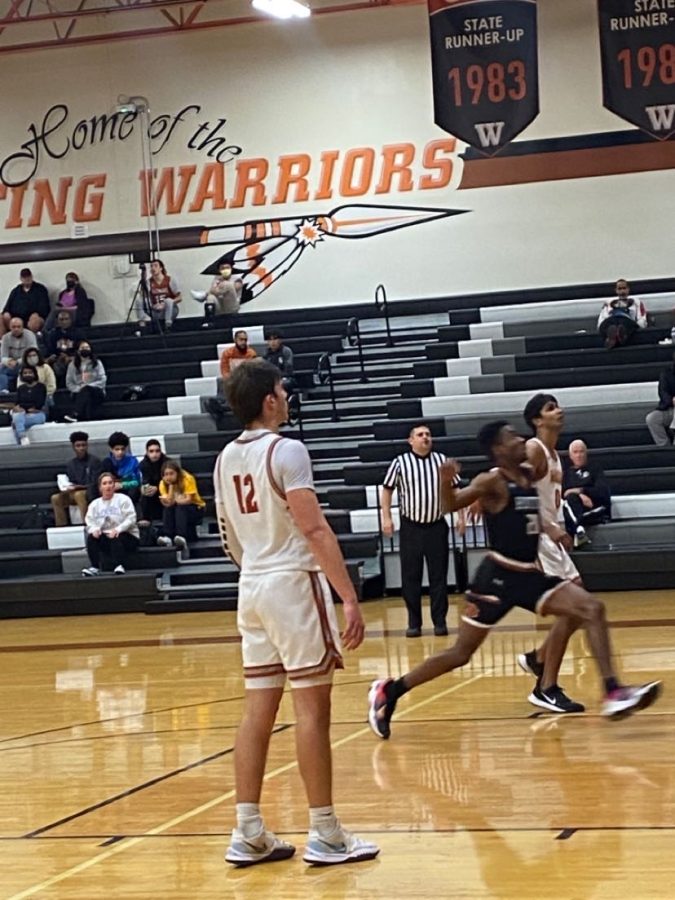 Zach Engels 22 waits for a rebound in the varsity game against Hutto.