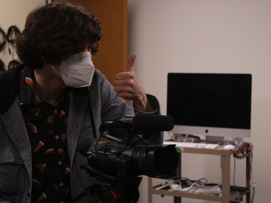Gabe Trout 23 prepares camera for mockumentary project. The mockumentary project was was a challenge the AV class took on in AV 1.