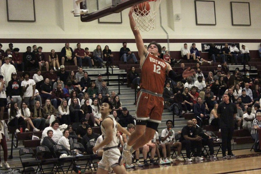 Stealing the ball Zach Engels 22’ blows past Round Rock players and dunks. This was during the second quarter when Round Rock started to close in on the Warriors lead.