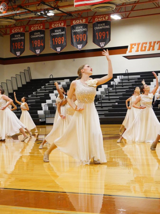 Three hours after the Warrior Pride call time at noon, Sophie Steinhauser 22 dances in their contemporary routine. At the award ceremony at the end of a long day, Warrior Pride was announced as the first place winners for their contemporary routine. 