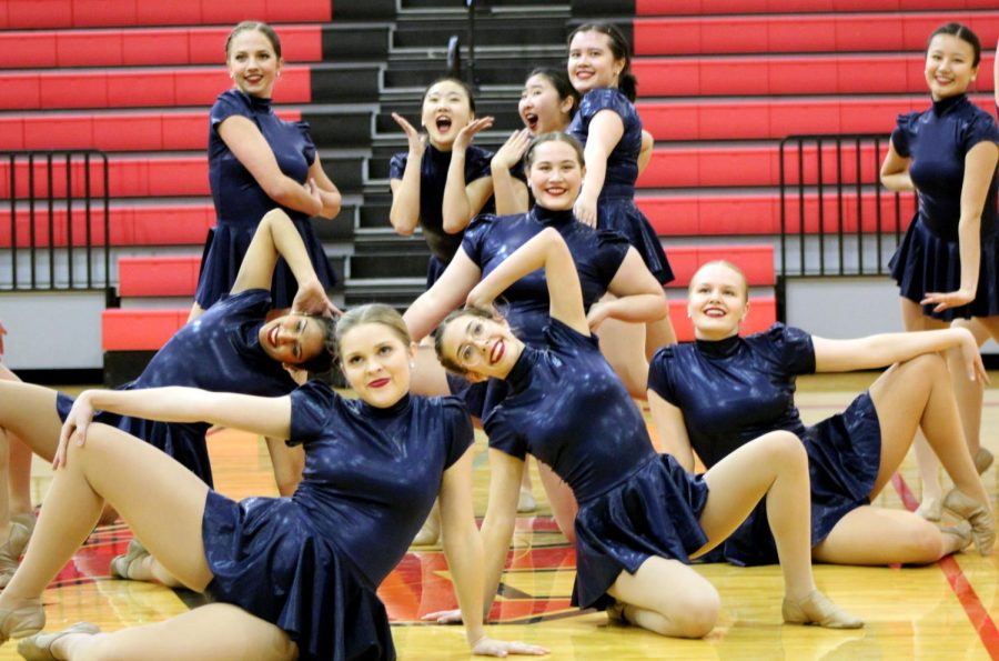 Striking a pose, the SunDancers finish their award-winning jazz routine to Somethings Gotta Hold on Me. This routine is a fan and dancer favorite. I really like performing the jazz dance because I can really show my personality in it, Zoe Bellomio 24 said. 