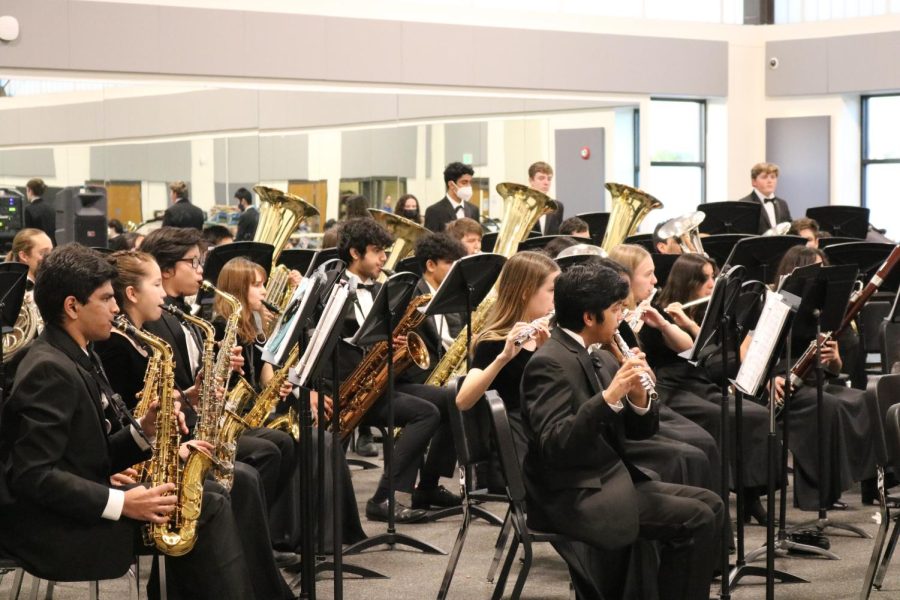 The saxophone and flute sections of the Symphonic Band play in harmony with the rest of the band. They were led by Mr. Brandon Winters at their pre-UIL concert.  