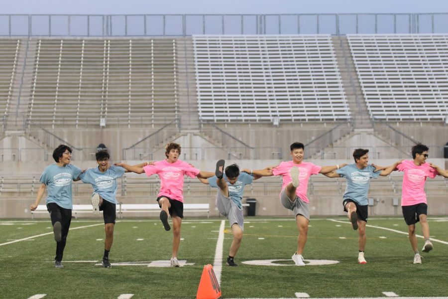 Ansh Patel 22 performs alongside his fellow Powderpuff cheerleaders. The male cheerleaders blew the audience away with their halftime performance. 