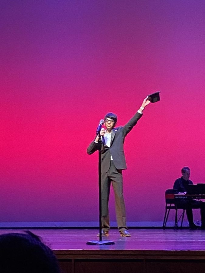 Ashish Jacob 23 follows up his endearing performance of Fly Me To the Moon by Frank Sinatra with a tip of his hat towards the excited audience.