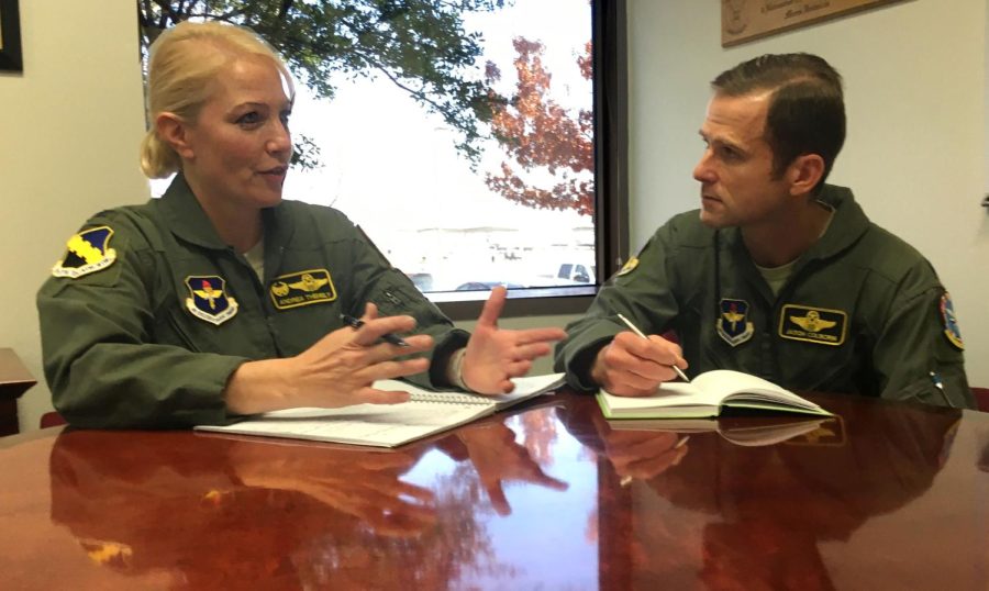 Col. Andrea Themely (left), 80th Flying Training Wing commander, talks to Lt. Col. Jason Colborn Dec. 20, 2017, about the opportunity he will have as the first detachment commander of a new unit called Pilot Training Next, an initiative led by Air Education and Training Command Commander Lt. Gen. Steven Kwast that will rely on different technologies to make a more efficient pathway for the Air Force to train and create pilots. (Caption by USAF Public Affairs)
https://www.aetc.af.mil/News/Photos/igphoto/2001860782/