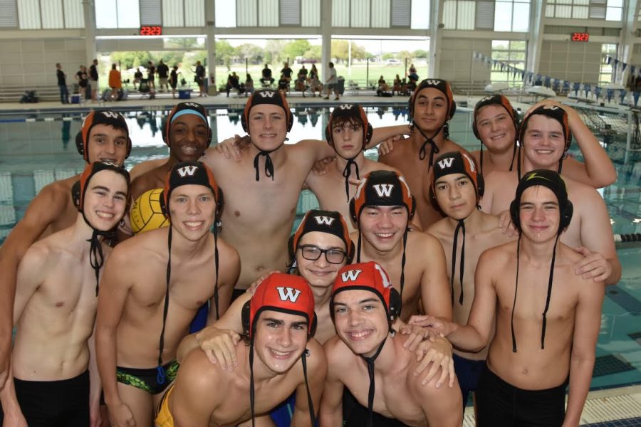 Westwood Waterpolo team boys gather for team photo together after day long tournament. This is Westwood water polos first year as a UIL sport. The tournament took place August 