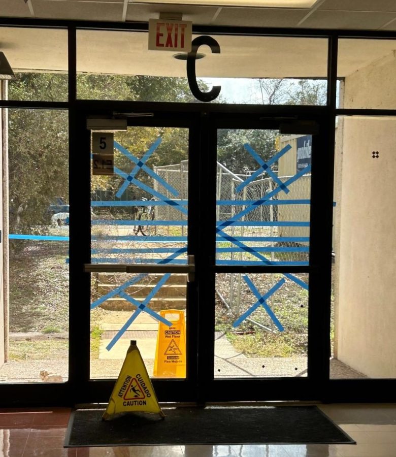 Damage done to the school due to the ice storm includes a shattered door in the downstairs E Wing.