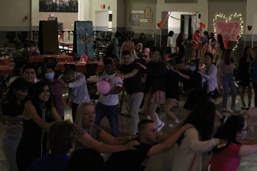 Dancing, students come together in a conga line led by the FAC, FFC and FOC students. At the dance, students had the opportunity to meet peers from across the district. 