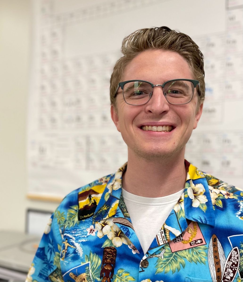 Smiling, Mr. Alex Klussmann shows his school spirit on beach dress-up day. Entering his first year teaching, Mr. Klussmann is excited for all to come in his new journey.