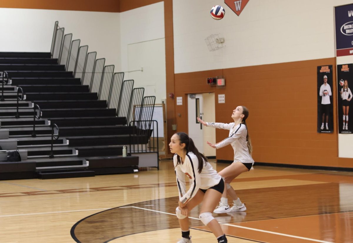 With focus and precision, Caroline Kiefer 26 serves up a storm in the second set. The Lady Warriors attempted to make a comeback after losing the first set, Kiefer in the right back position, led the Lady Warriors with serves.