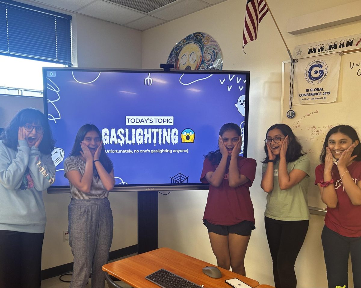 Animated with a shocked expression, Psych Club officers begin their meeting with a slideshow on the basics of gaslighting.