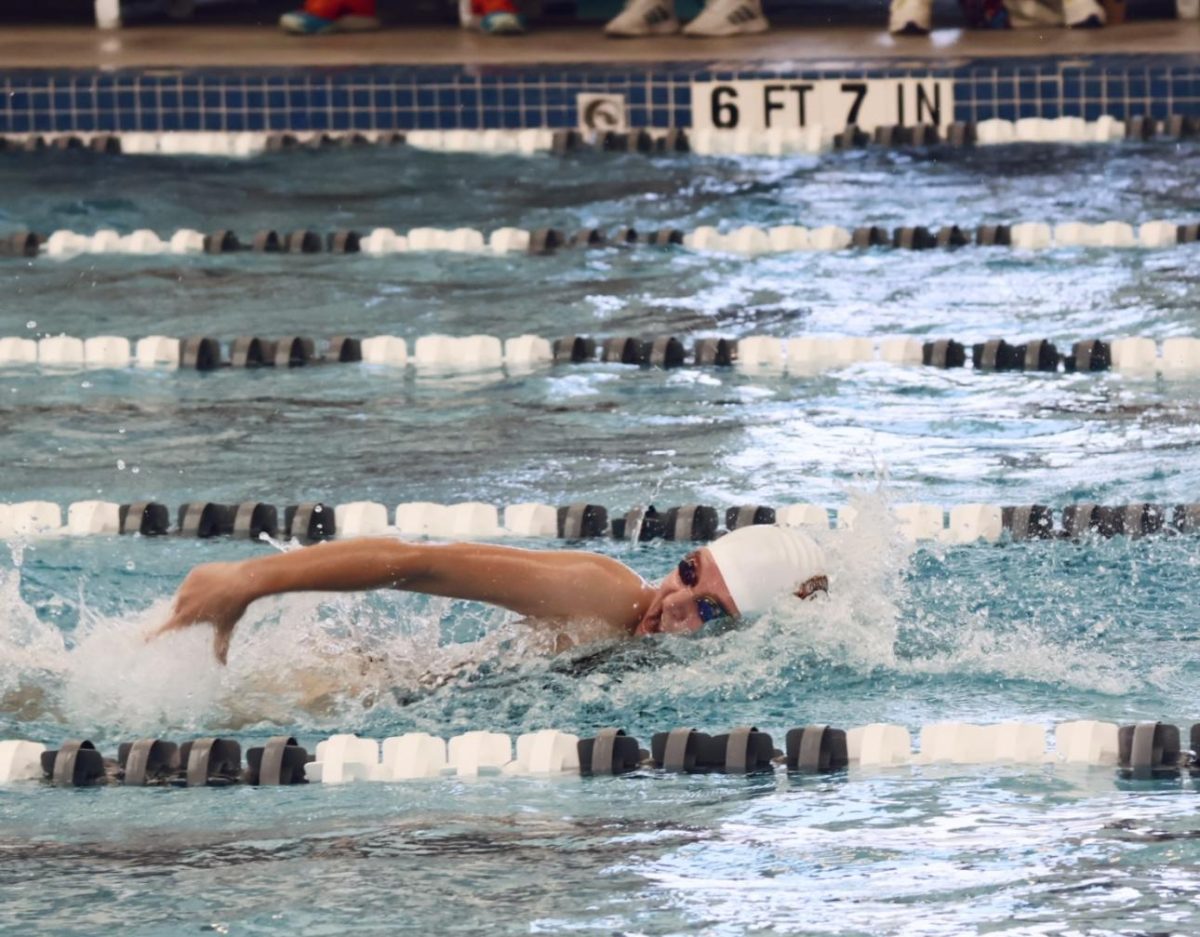 Taking a quick breath, Jaden Steen 24 races to the wall. As the last leg of the 200-yard-medley relay, she played an intricate role in gaining points for the girls during the Round Rock Opener. 