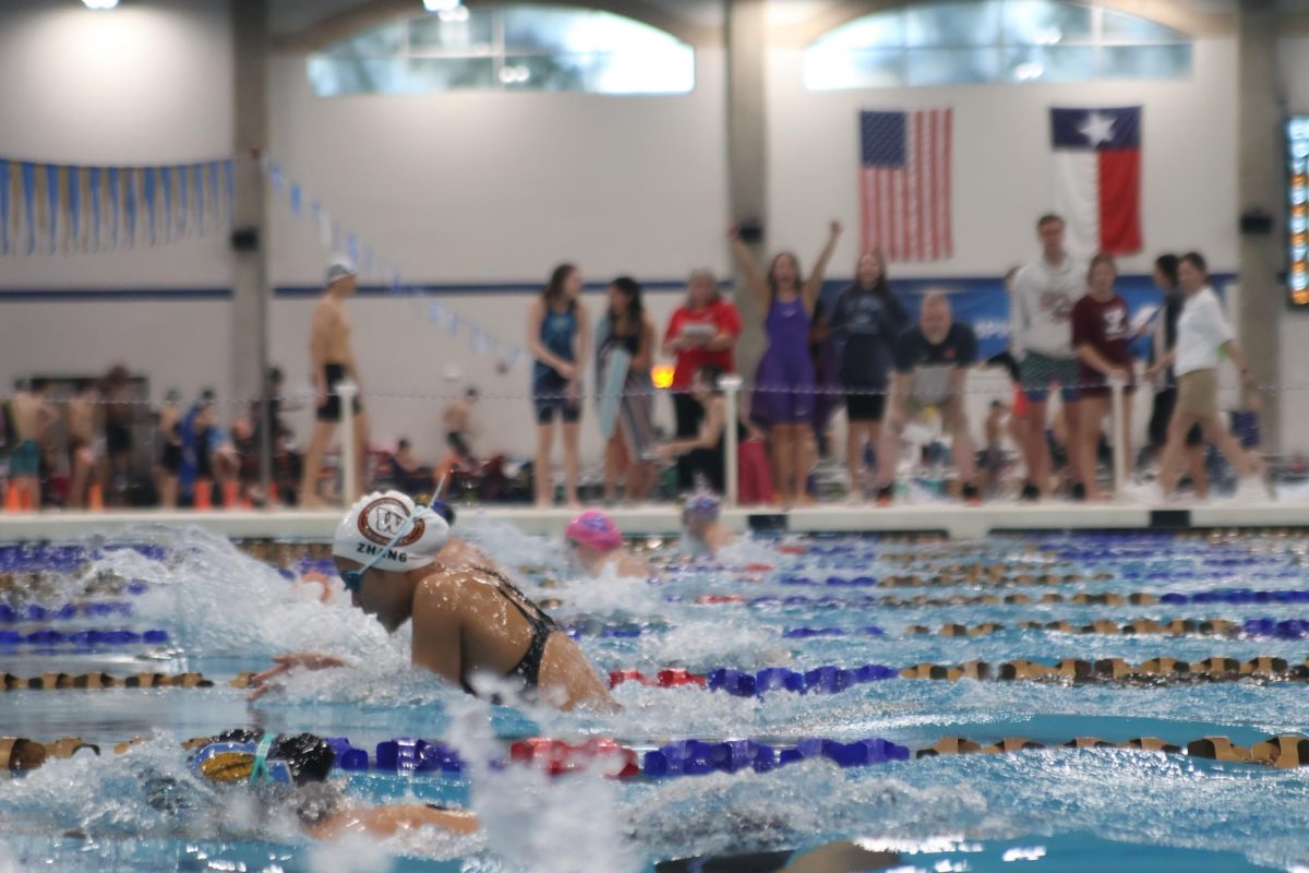 Keeping her head low, Leah Zhang 26 completes the first 50 of the 100-Breastroke. Zhang specializes in mid-distance events such as the 100-Yard-Breastroke and the 200-Yard-Medley.