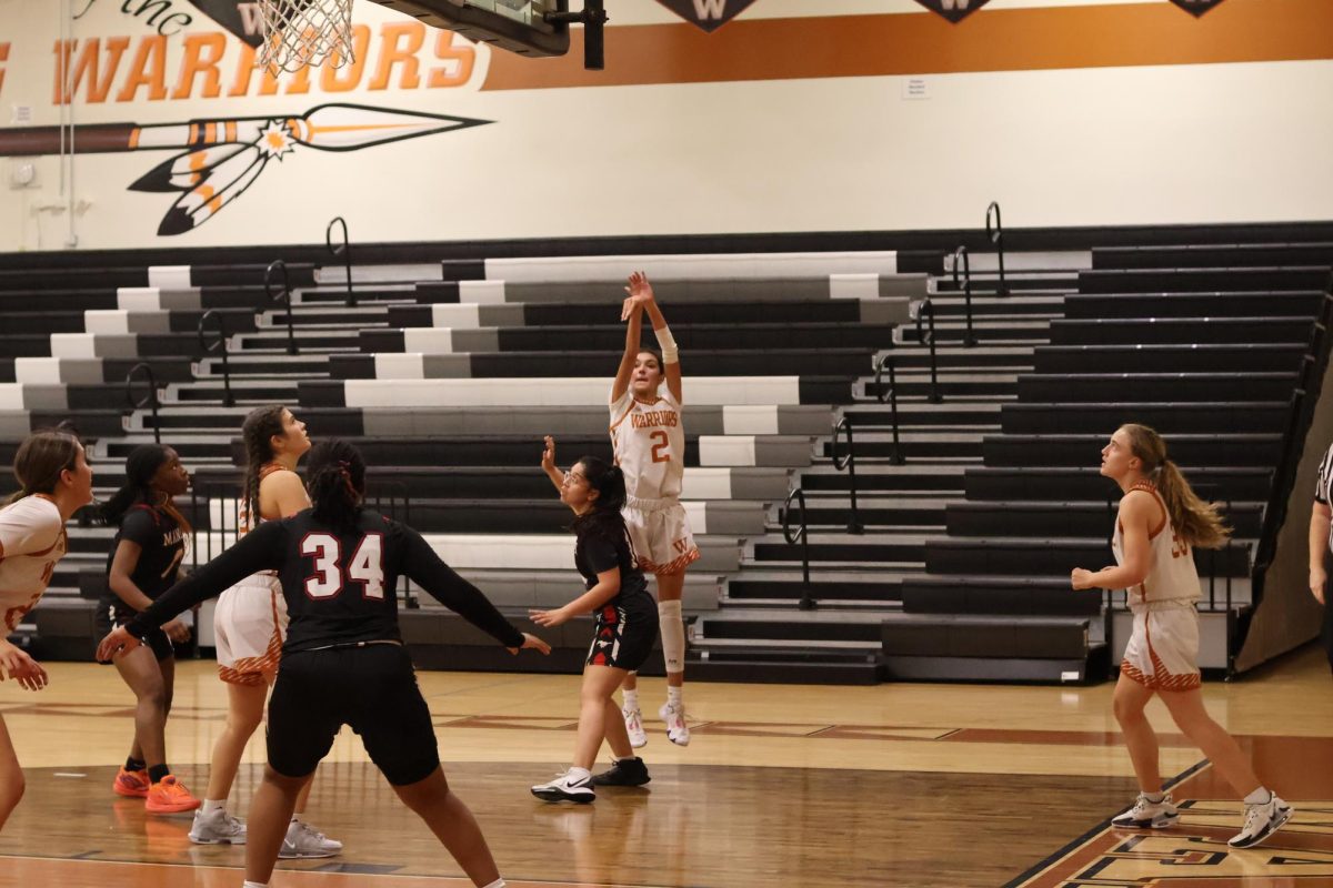 Firing from the 3-point line, Hadyn Espinoza 26 flicks her wrist and aims for the basket. With no defense on her, Espinoza took a shot at the attempt of putting her team up in points. 