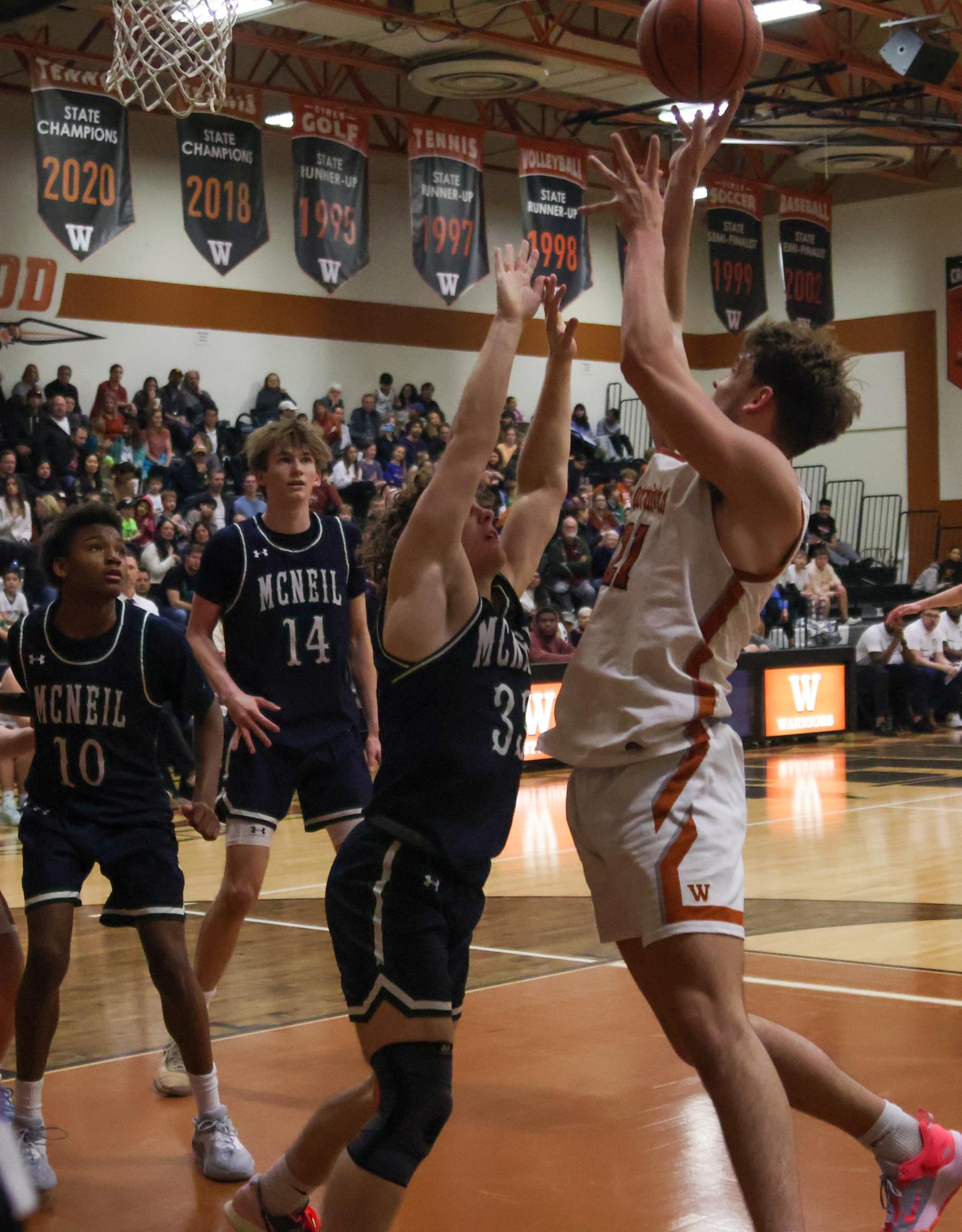 GALLERY%3A+Varsity+Basketball+Secures+Victory+Over+Rival+McNeil+Mavericks