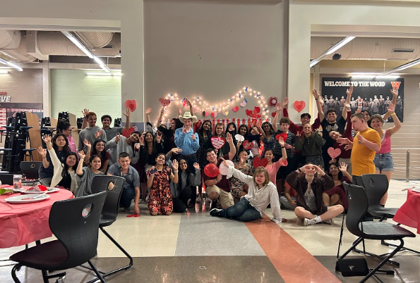 Posing for a photo, Valentines Day Dance participants come together to celebrate the holiday. An annual district-wide dance, StuCo organized this event for students with special needs. 