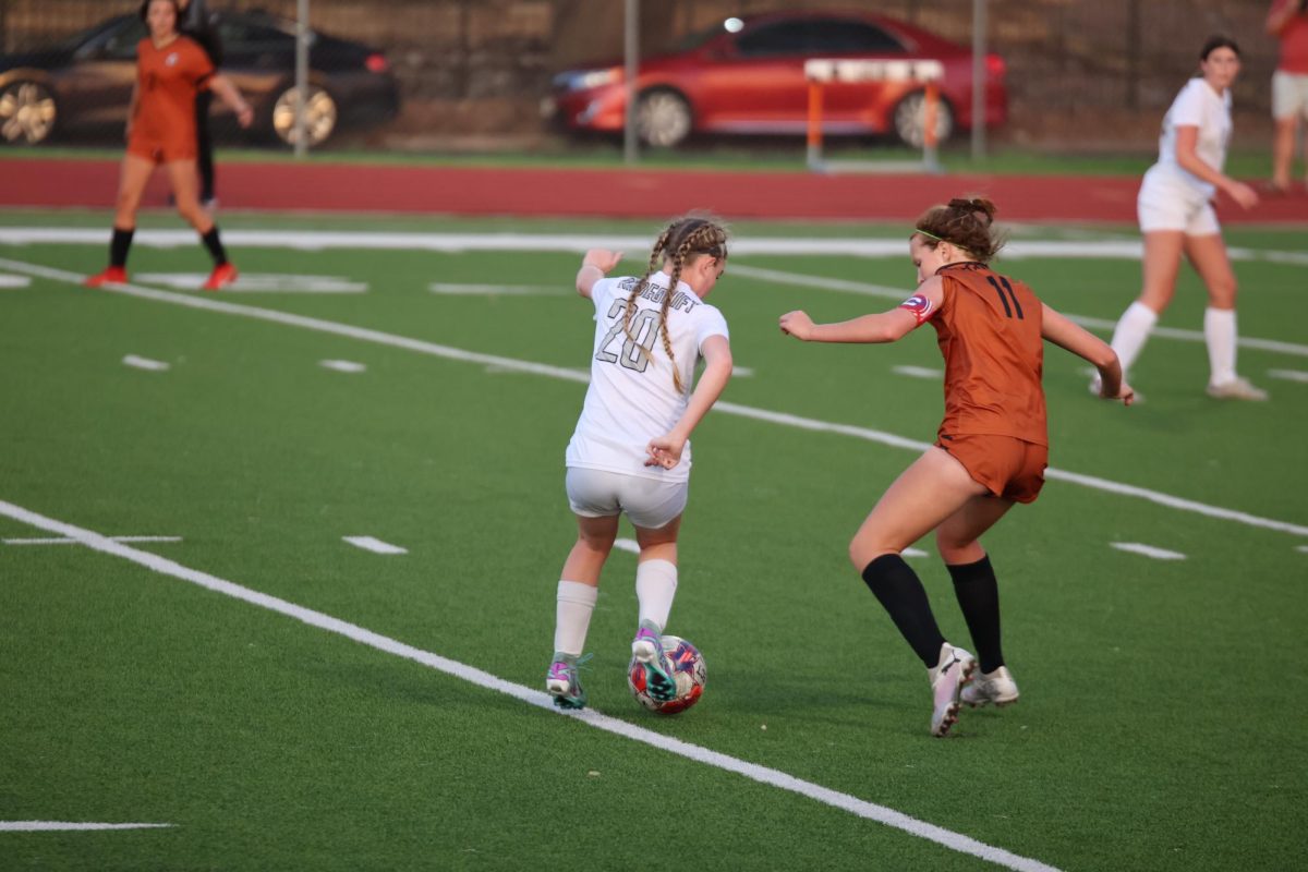 Focusing in on the ball, midfielder Henley Patak 27 moves to gain back possession of the ball from Viper offense. The Vipers and their aggressive offense proved to be a challenge for the Warriors, preventing them from scoring more than one goal. 