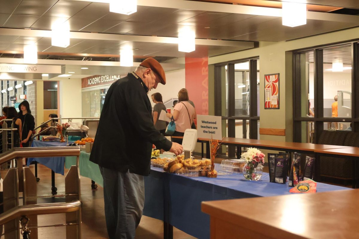 During PTSAs organized event, faculty members pick up breakfast items during Teacher Appreciation Week. PTSA provided a wide range of cuisines for the teachers to start their day.