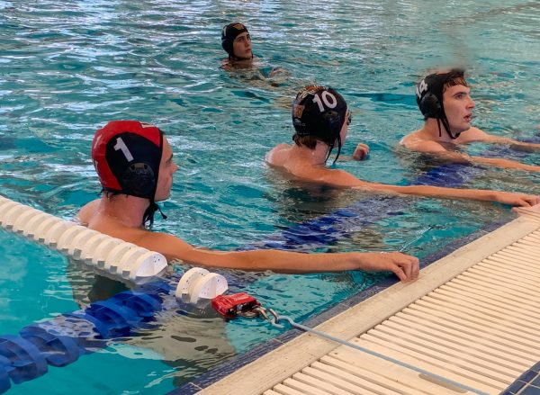 Preparing for their final game of the RRHS tournament on Saturday, Aug. 24, Cole Osborn '25, Ben Meijers '25, and Henry Grundman '25 stretch their legs and listen to their coach's final remarks on their gameplan. "We keep getting better and better." Coach Matthew McBrearty said, "every goal that was scored on us this tournament was just a misstep, when we are consistent it's pretty impossible to score on us." The warriors ended the tournament 3-0-1 after tying their final game agianst Taft