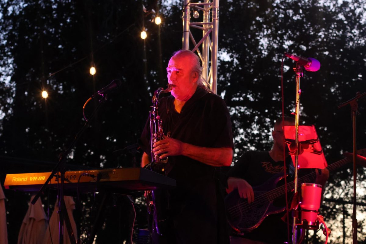 Improvising a solo, saxophonist Jim Trimmier finds a natural gap in the performance and fills it with tantalizing rhythm. 