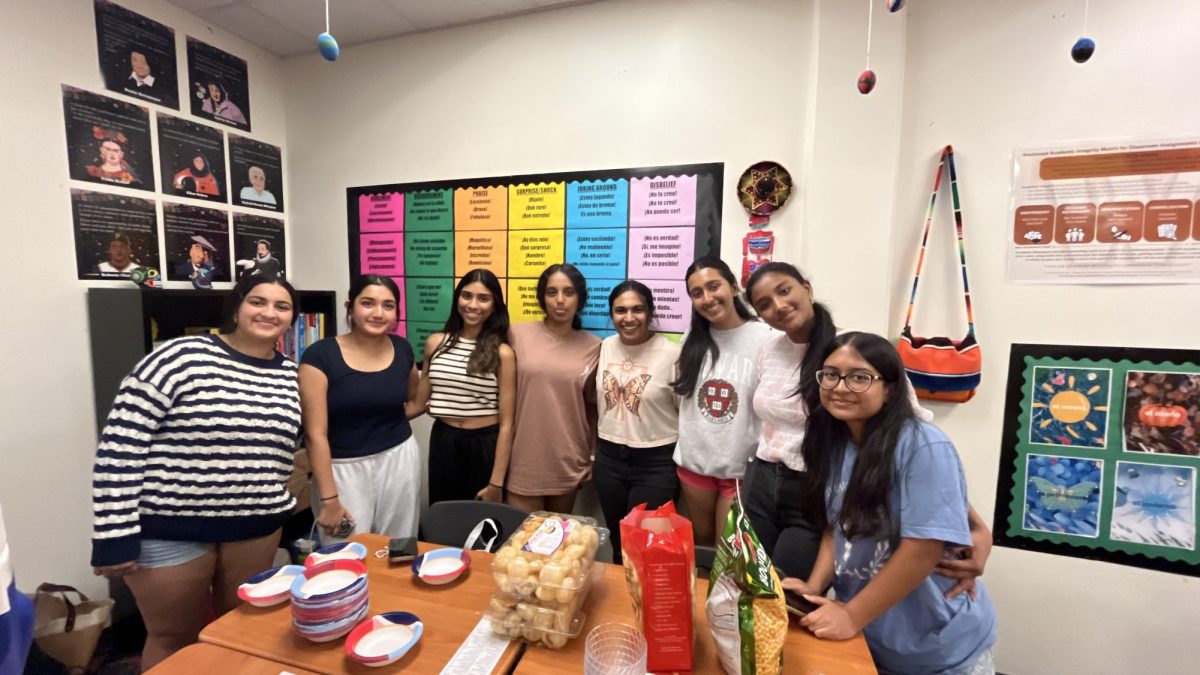 Smiling wide, SASA officers pose for a picture as they set up for the Pani Puri Competition. The event saw a big turnout, a proud point for the officers that noted putting immense effort and prep into the competition. 