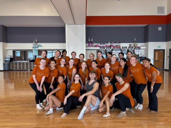 The Westwood SunDancers smile ear to ear next to their guest dance teacher. Throughout line camp they had many teachers to come in to teach master classes for styles from contemporary to hip-hop. 