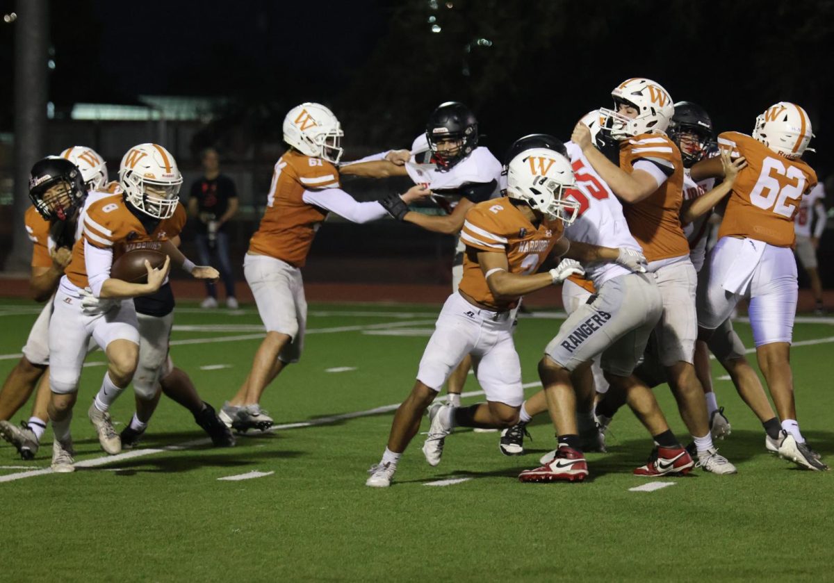 The Warriors are clashing with The Rangers, While Carter Cobb ‘27 (#8) brushes past the offense. Even though the Warriors were trailing behind, they stayed strong in their last moments. The Warriors played their last game of the season against Vista Ridge.