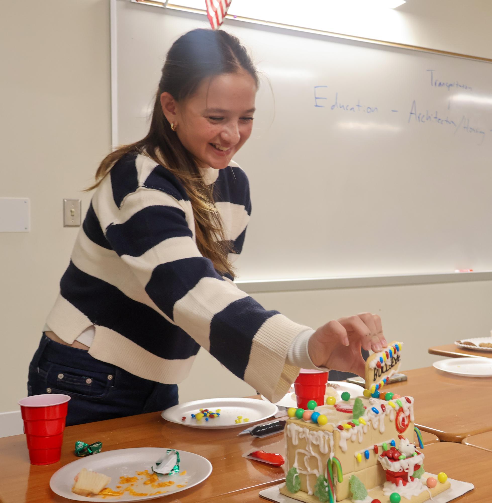 Outreach Club Cultivates Community at Christmas Social