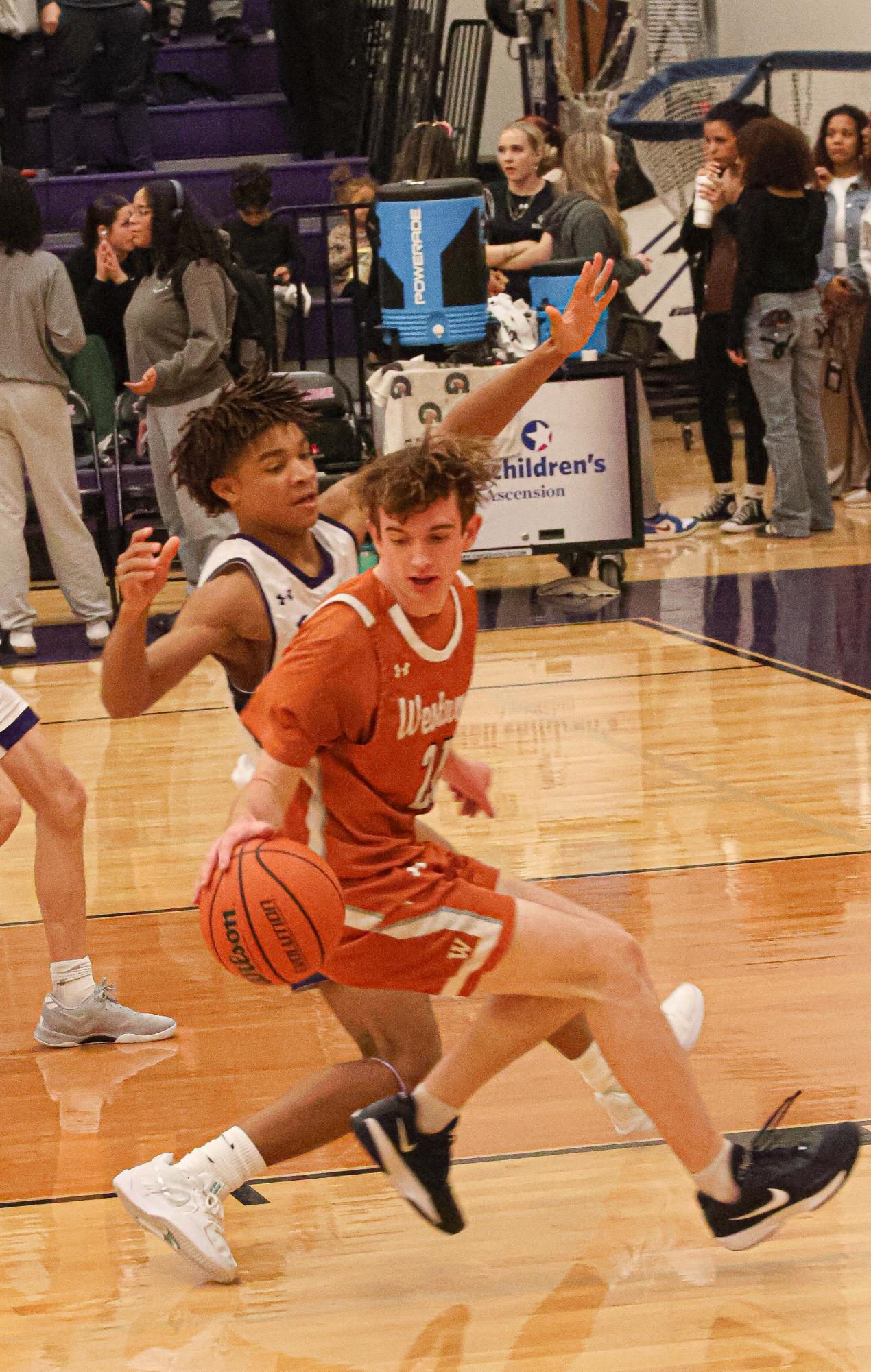 GALLERY: Varsity Boys Basketball Dunks on Cedar Ridge, Winning 63-40