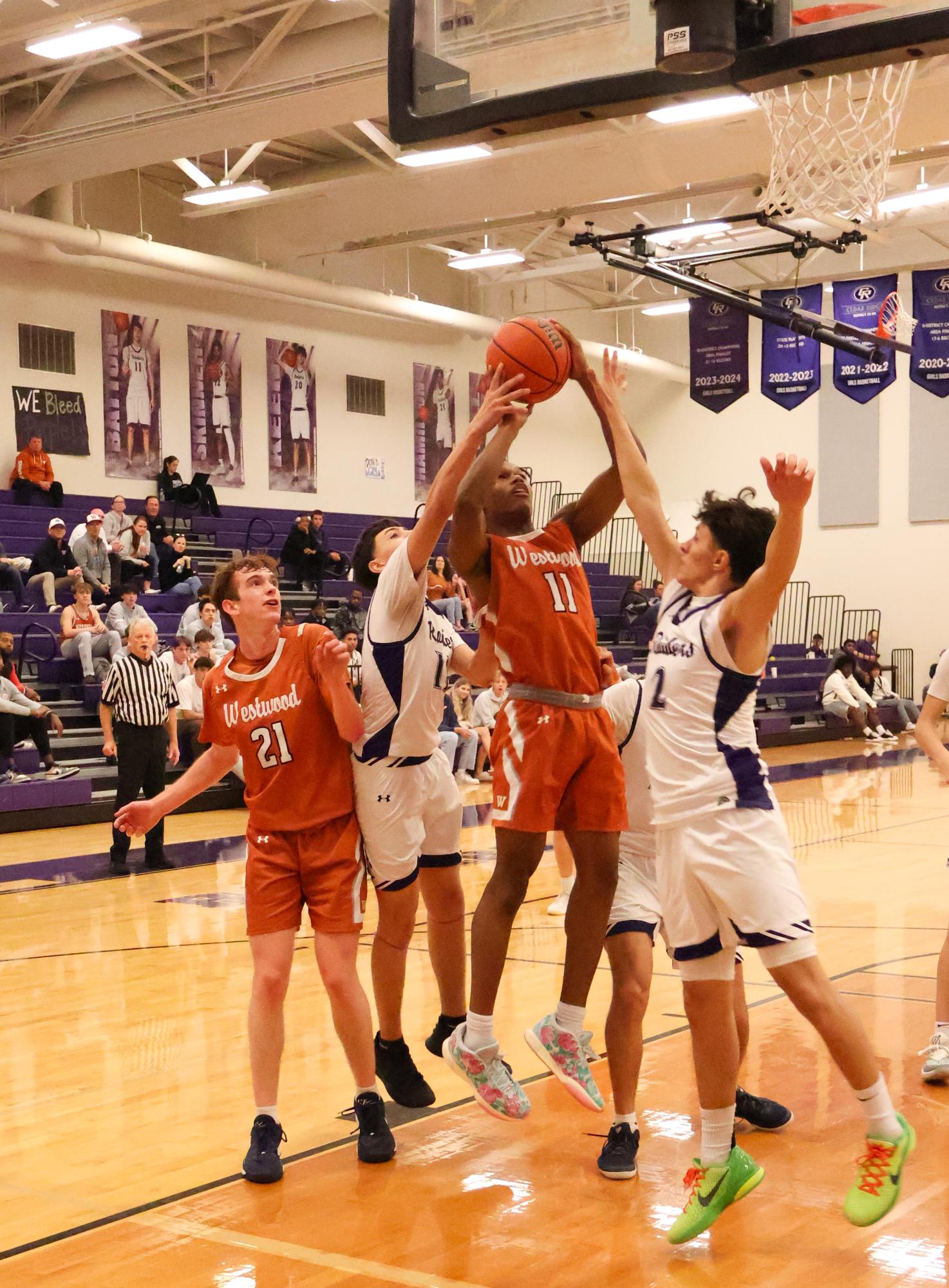 GALLERY: Varsity Boys Basketball Dunks on Cedar Ridge, Winning 63-40