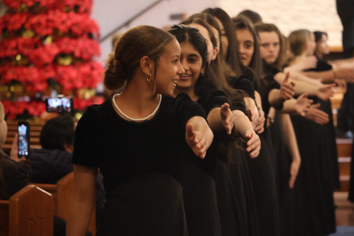 Opening the concert with passion, 'Bonk' abaphandle' is the song which greets the audience. Dancing with liveliness, Kamora Menendez ‘28 help open the concert with a cheerful  atmosphere. 
