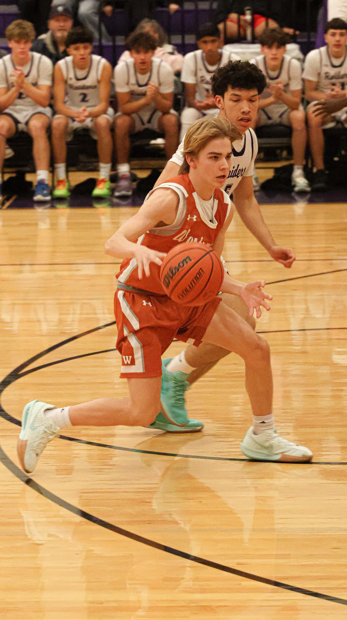 GALLERY: Varsity Boys Basketball Dunks on Cedar Ridge, Winning 63-40