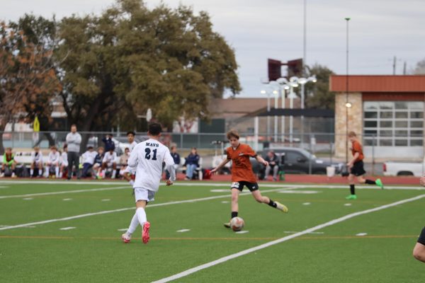 James Engle '28 advances the ball toward the Maverick goal. Despite the Mavs creating a strong defense, the Warriors would keep on attacking.