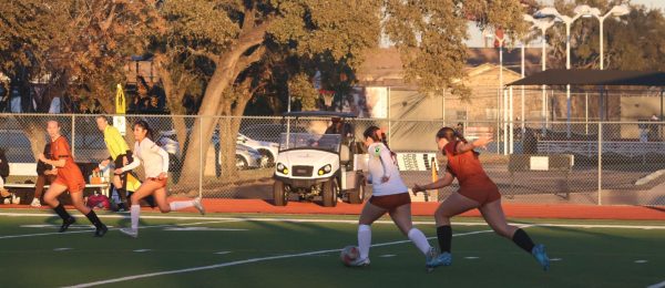 Focused on the ball, Defender Kensington Kaynes '28 chases Hippo offense to regain possession. The Warriors brought renewed aggressiveness to the game in order to keep Hutto's score at a zero. 