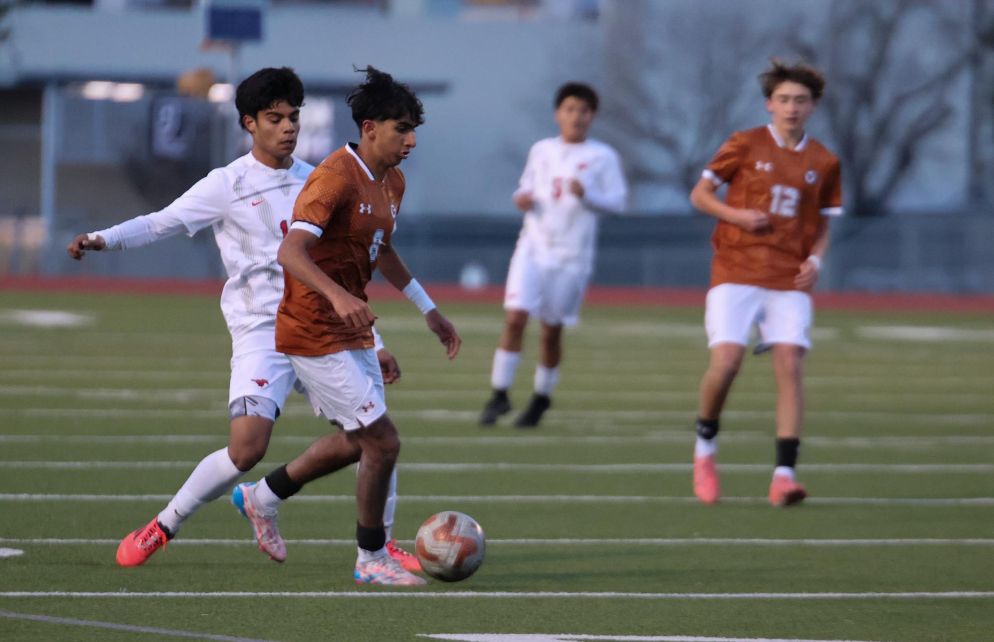 Varsity Boys Soccer Deconstructs the Manor Mustangs 3-2 in Third District Game