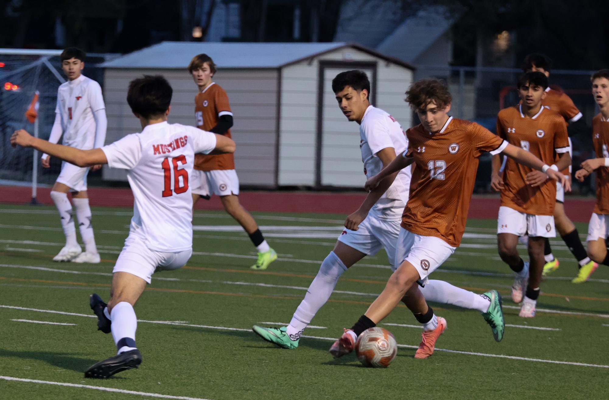 Varsity Boys Soccer Deconstructs the Manor Mustangs 3-2 in Third District Game