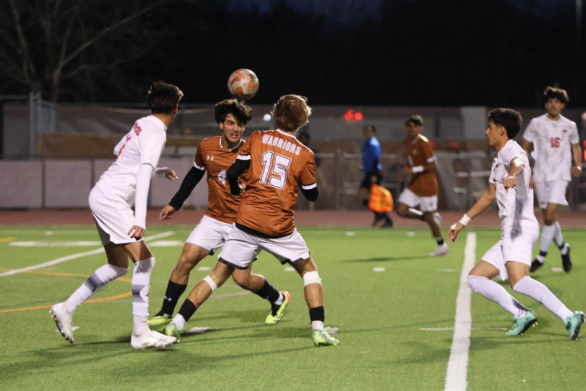 Varsity Boys Soccer Deconstructs the Manor Mustangs 3-2 in Third District Game