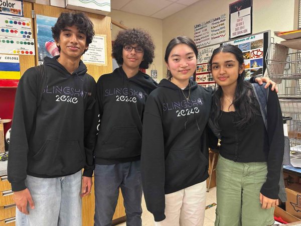 Coming together for a photo, sophomores Arhaan Jafri, Ali Aslam, Yonnie Yang, and Rupal Jain celebrate the conclusion of the volunteering event. After weeks of planning, Team Slingshot members were relieved that their plans had gone smoothly. 